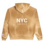 A gold hoodie with white text