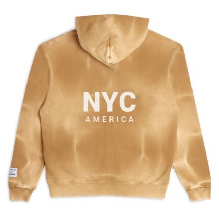 A gold hoodie with white text